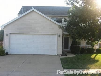 Front View
						:
						Two story, two story garage, front porch, new landscaping, and fenced in yard.