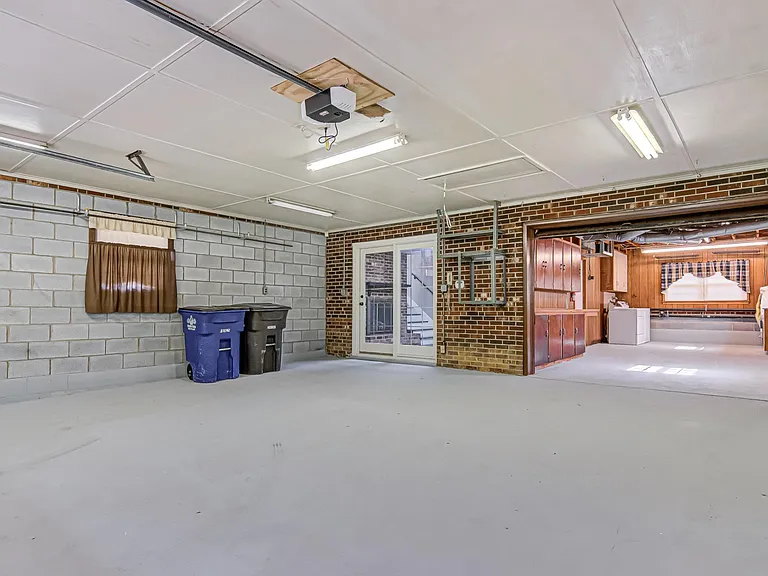 2-Car Garage looking into Storage/Laundry Space