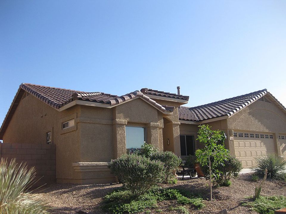 Front. 3 Car Gar. Tile Roof