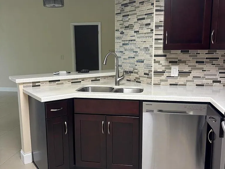 8761 Wiles Rd #304 — Photo 3