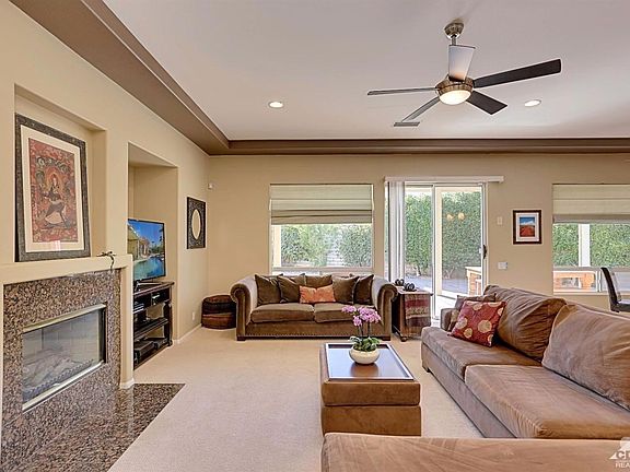 Open concept living with direct patio access.