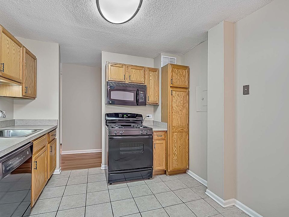 Open kitchen layout with ample cabinet space