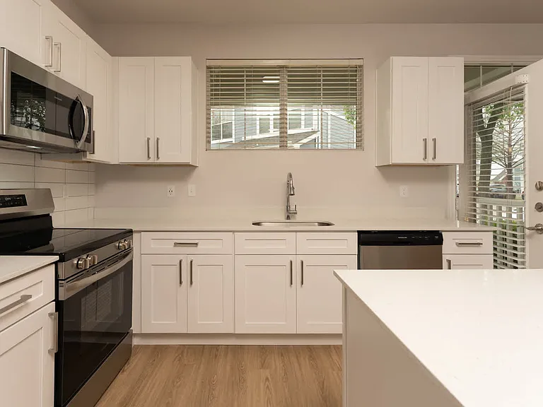 Kitchen with island and hard surface