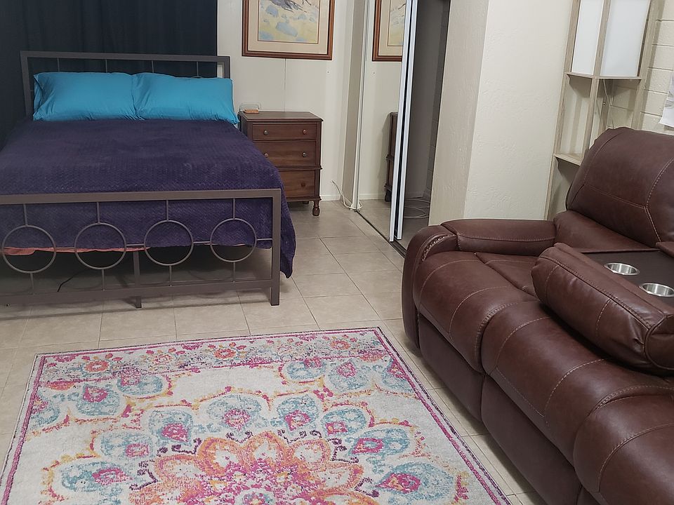 Furnished bedroom area.