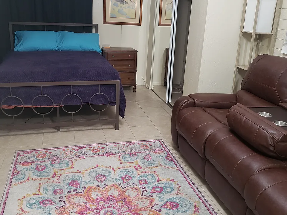 Furnished bedroom area.
