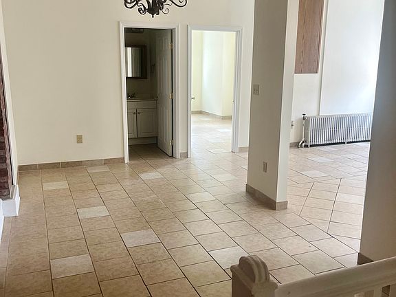 Living Room with open floor plan into kitchen & dining area