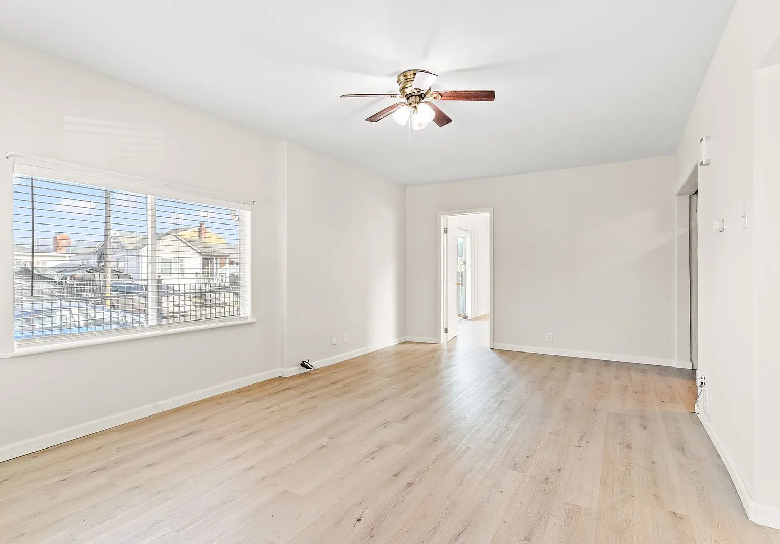 Bright & Updated 2-Bed, 1-Bath Corner-Lot Home | Gated Yard and Driveway — Photo 2