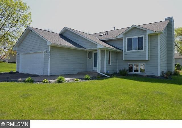Located on a corner cul de sac lot this home is well maintained and features a small exposed aggregate front patio and walkway.