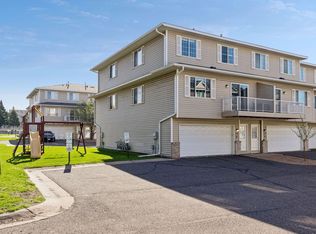 1587 County Road D E UNIT F, Maplewood, MN 55109