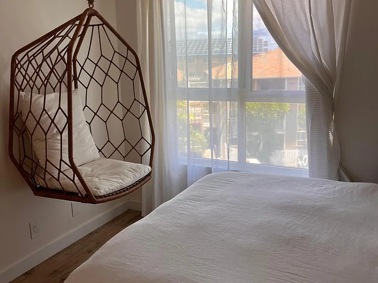 Master bedroom has a swinging egg chairs (mounts on the wall) with views of Haleakala.