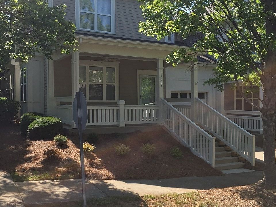 Rocking chair front porch over looking the street