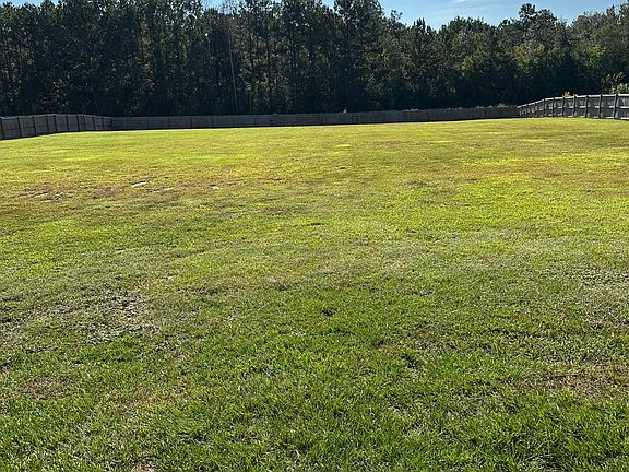 Privacy fenced in backyard