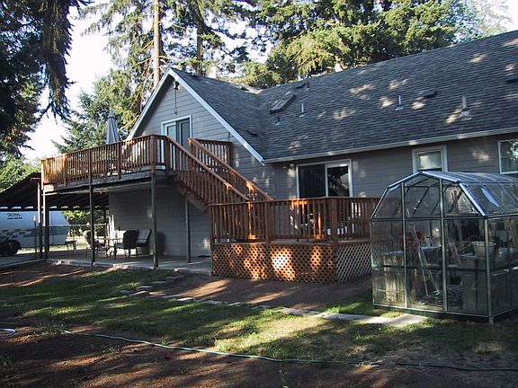 View of decks in back of house