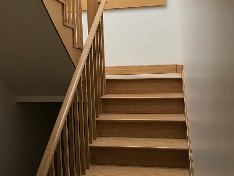 Stair to third floor, operable skylight above