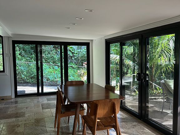 large slider windows, dining space