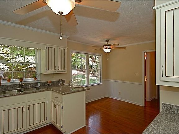 Breakfast area accommodates breakfast bar and breakfast room.