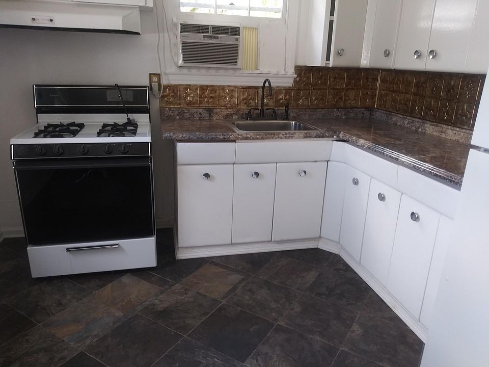 Totally authentic original vintage metallic cabinets that have been preserved. Not particle board... .