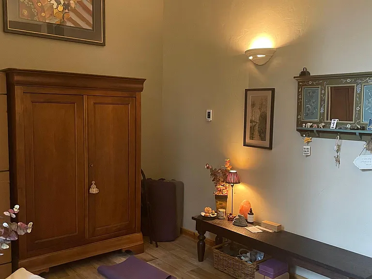Mudroom and yoga space. Heated flooring and yoga props.
