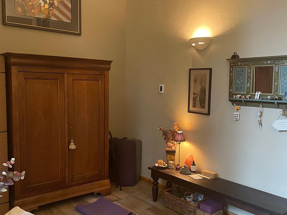 Mudroom and yoga space. Heated flooring and yoga props.