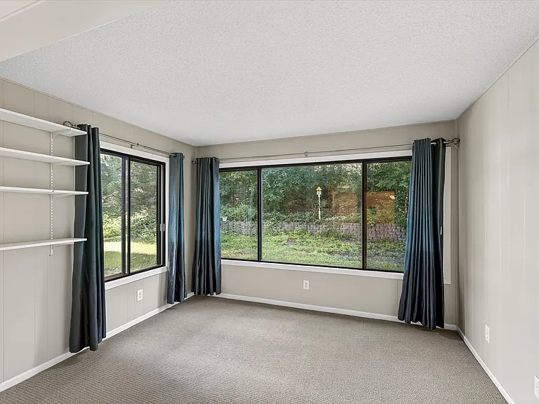 Sunroom with north and west facing windows - beautiful grounds outside