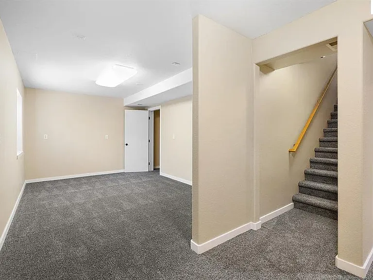 Steps leading to finished basement