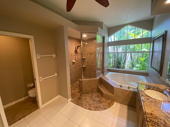 Master bath with shower, jetted tub, huge counter space. Two sinks.