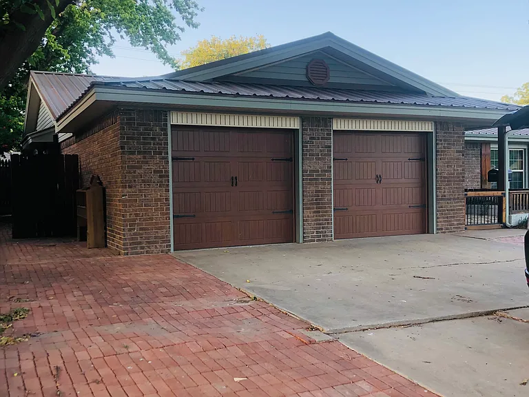 Ample parking for three cars in driveway. Also street parking for many more.