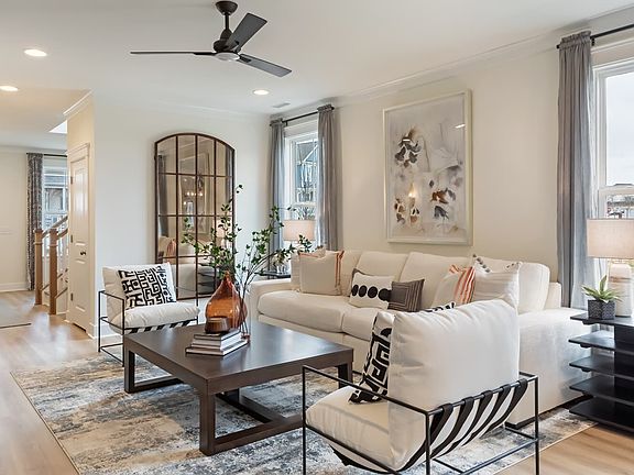 The living room of the Declan by Brookfield Residential at Wendell Falls