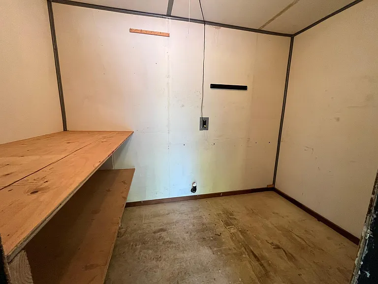 Storage closet inside the two-car garage