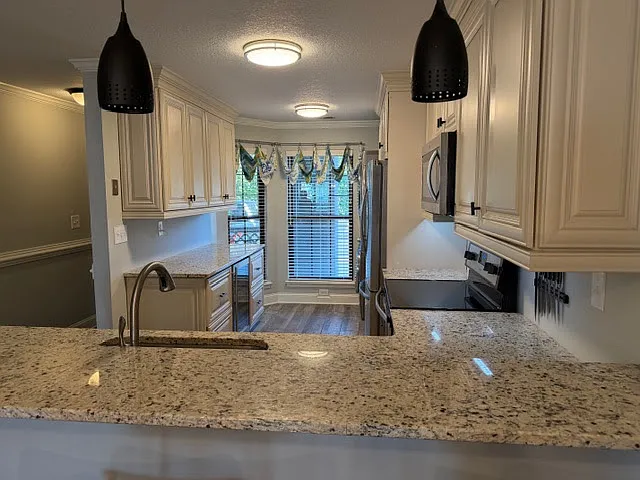Custom Coffee/Entertainment bar area with built in wine refrigerator