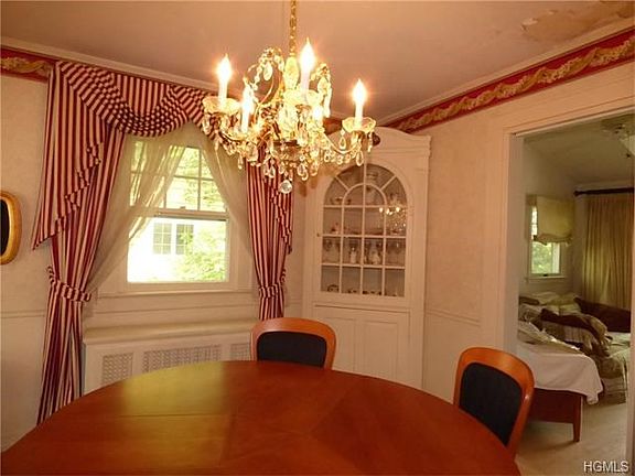 Formal Dining Room with built -in corner curio cabinet