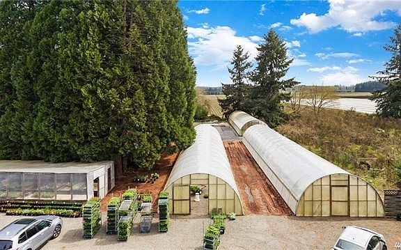 This shows the 3 100' x 20' greenhouses plus one of the additional growing areas.