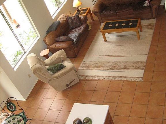 Casual Lving open to kitchen with cozy fireplace and vaulted ceilings!