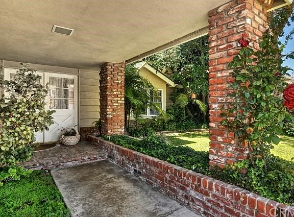 Beautiful brick work leads you to the front French doors