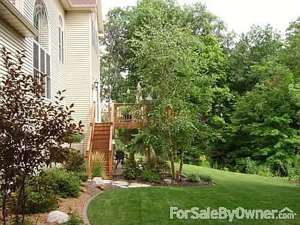 Back yard
						:
						Side view of back of house