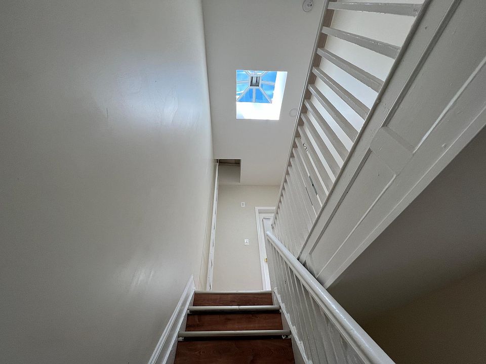 Skylight illuminates the hallway.