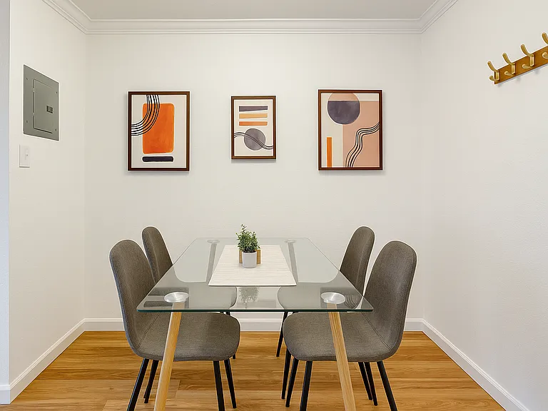 Minimalist dining nook with a modern look, perfect for stylish, cozy meals.