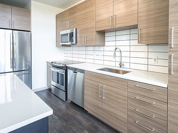 Custom cabinetry with chrome pulls