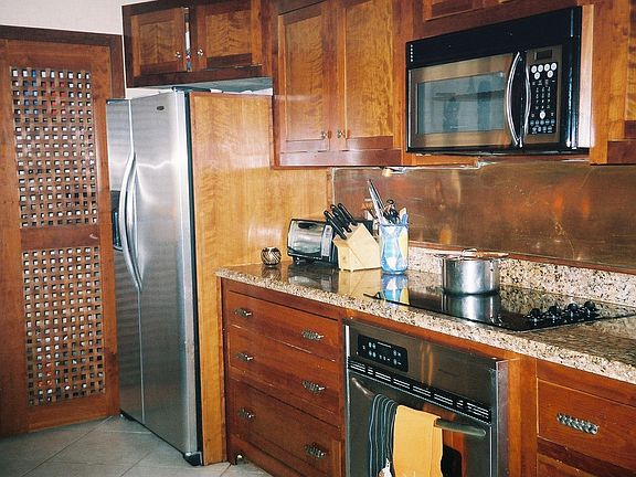Cherry and SS Kitchen w/woven wood doors