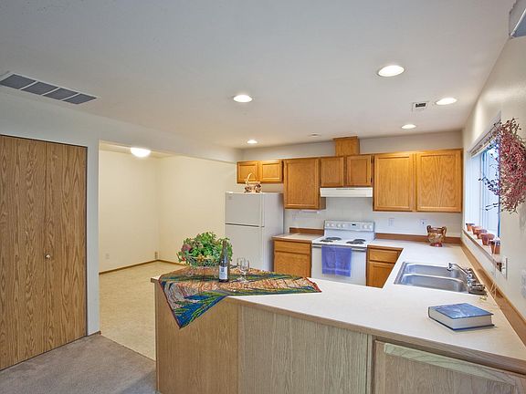 kitchen with room for full size table. Pantry storage.