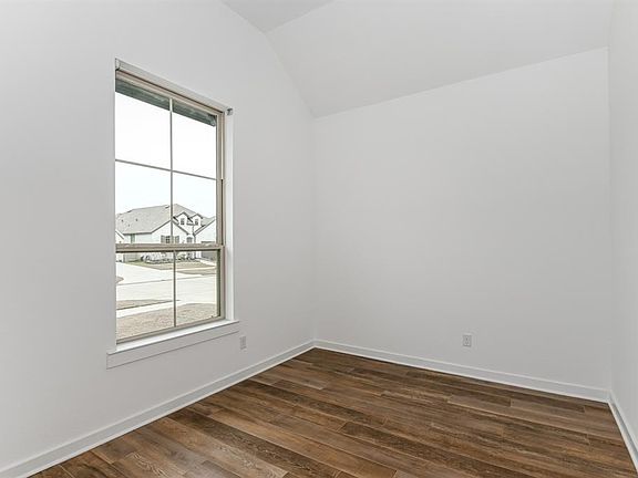 At the front of the home, away from the bustle of the main living area you will find the dedicated home office,