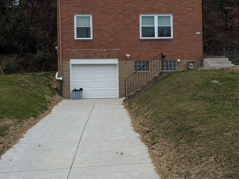 New 11 ft wide concrete driveway , new garage door with opener