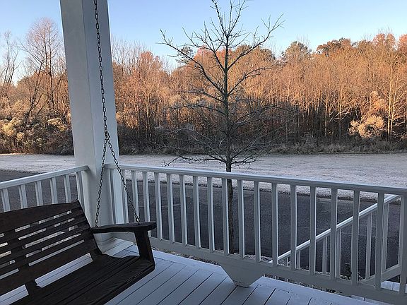 Front porch view of woods