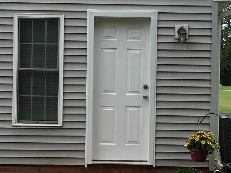 Welcome with Freshly Painted White doors & Highlighted with