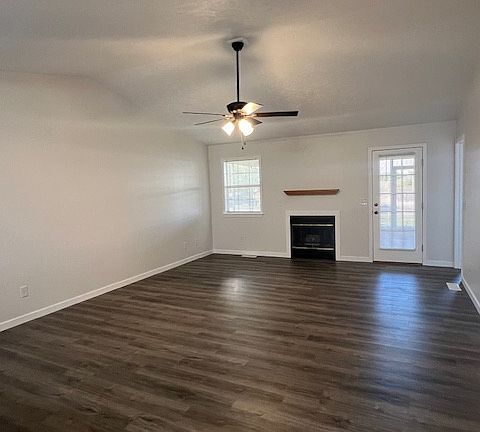 Spacious Living Area with Gas Log Fireplace