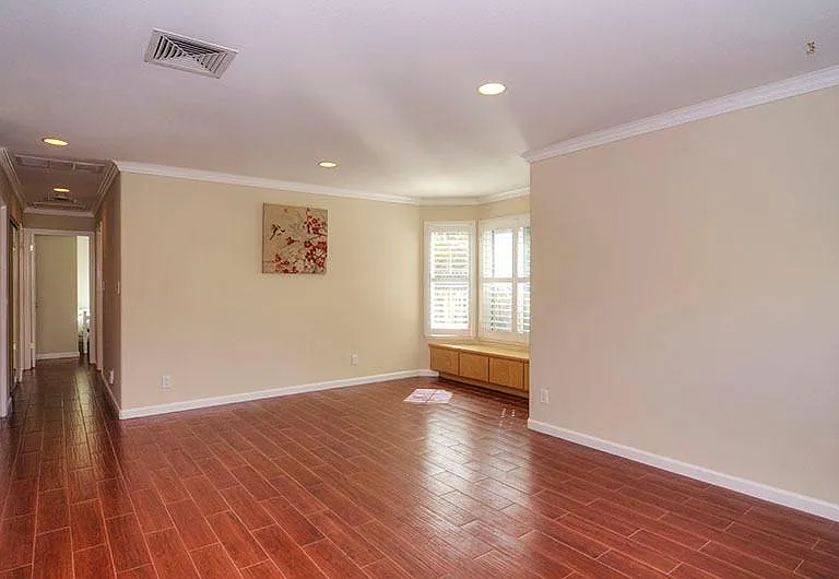 Front Door Entry Area: Entertaining area with bay windows. Hallway shown has Rooms 2-4 and Bathrooms 2-3.