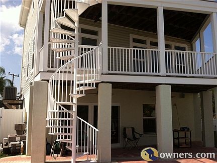 Back of Home Showing Spiral Staircase