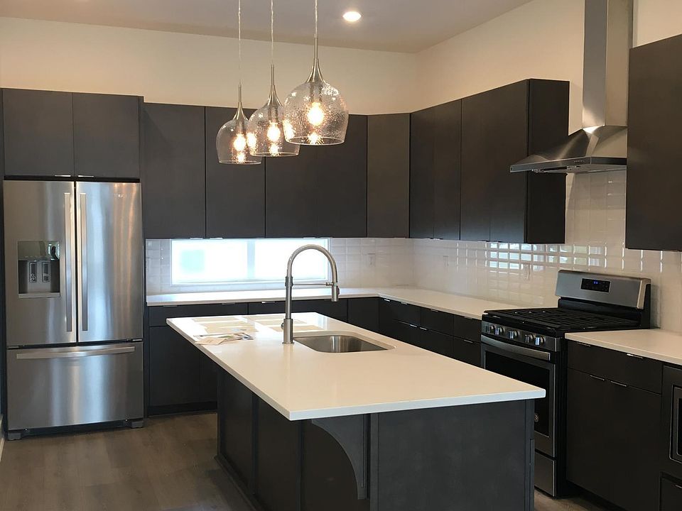 WOW! Loads of cabinet space, full pantry, gas range, gold s