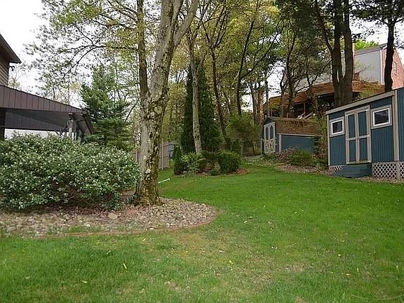 Back Yard with 2 Sheds - Large Shed for Tenant Storage
