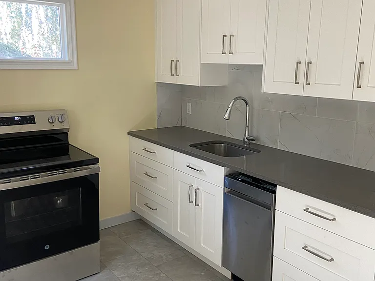 Light filled and completely remodeled Kitchen with brand new stainless steal appliances.